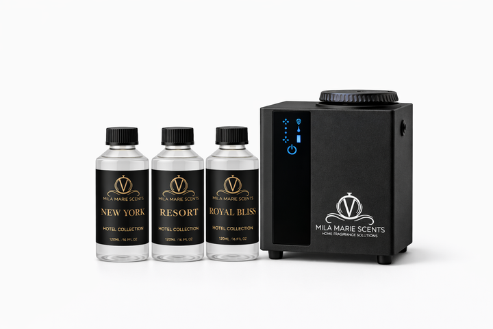 Mila Marie Scents diffuser and essential oil bottles on a white background