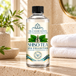 Shiso Tea spa-inspired home fragrance oil on a bathroom counter with towels
