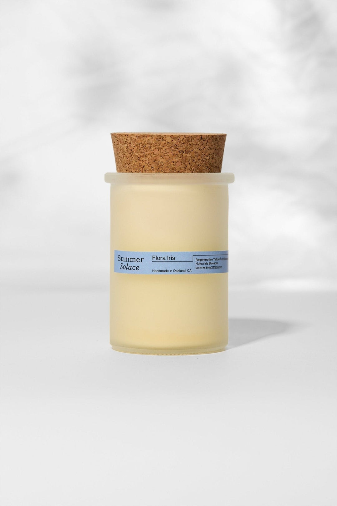Floral Iris Tallow Candle in frosted glass with orris and Palo Santo fragrance