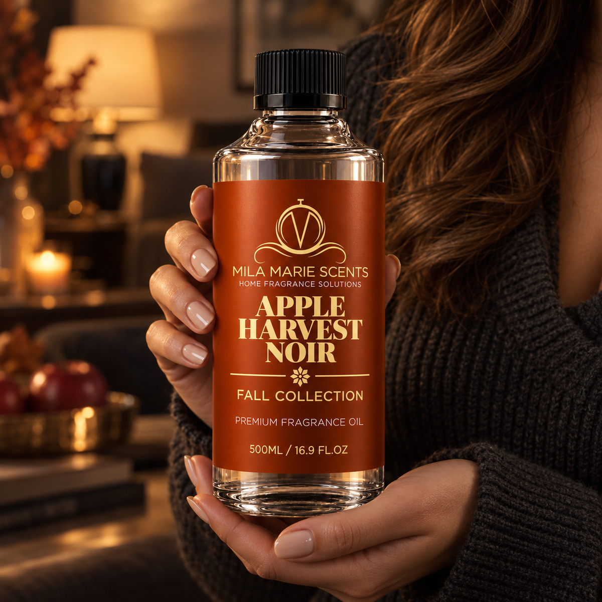 Apple Harvest Noir fragrance oil in dark moody luxury interior setting
